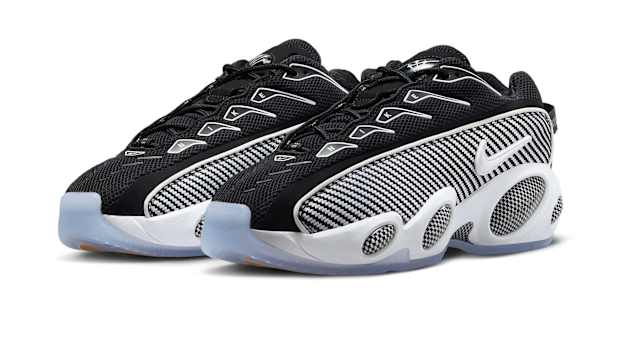 Side view of Drake's black and white Nike sneakers.
